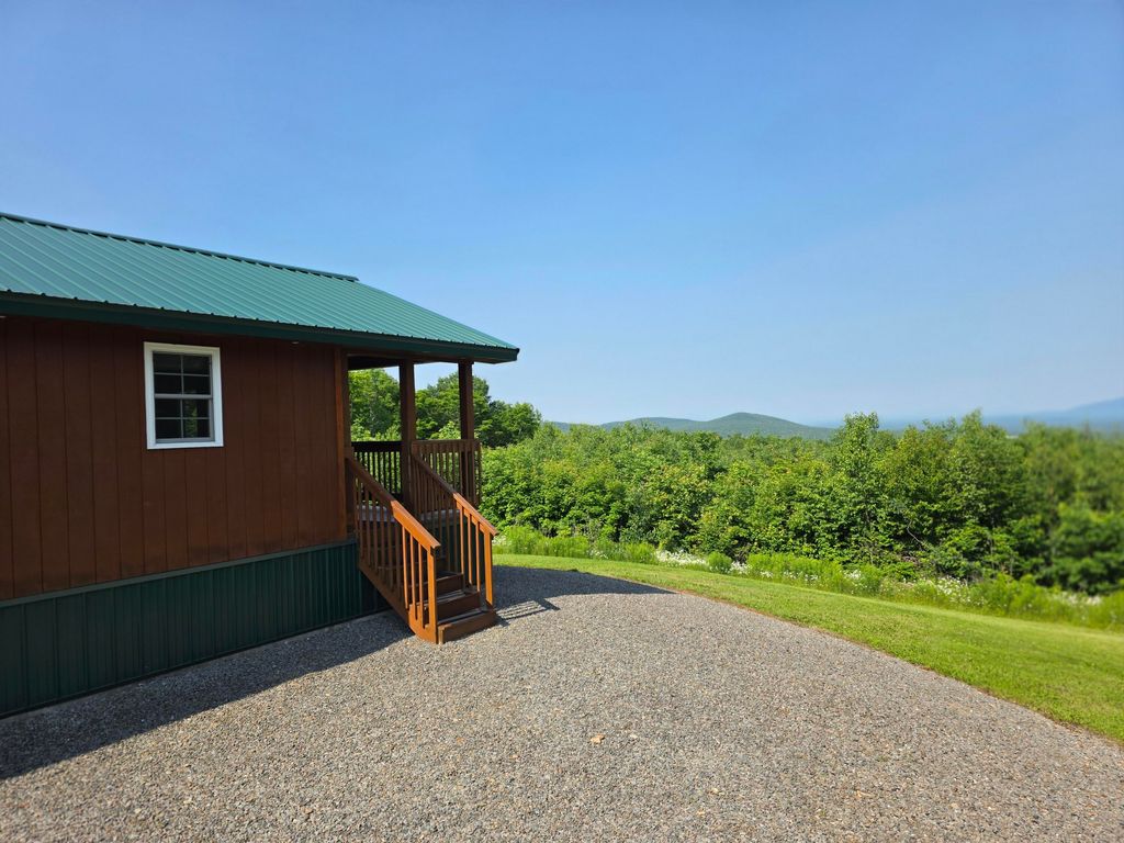 Photo of 202 Nelson Road, Oakfield, ME 04763 (MLS # 1669482)