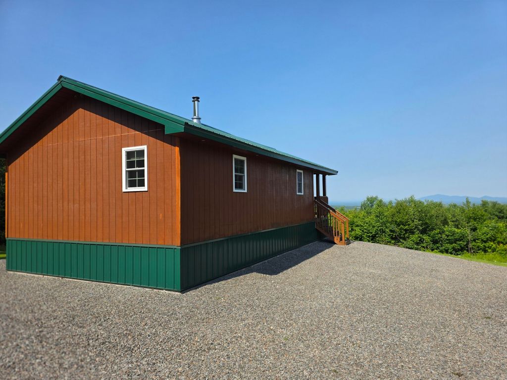 Photo of 202 Nelson Road, Oakfield, ME 04763 (MLS # 1669482)