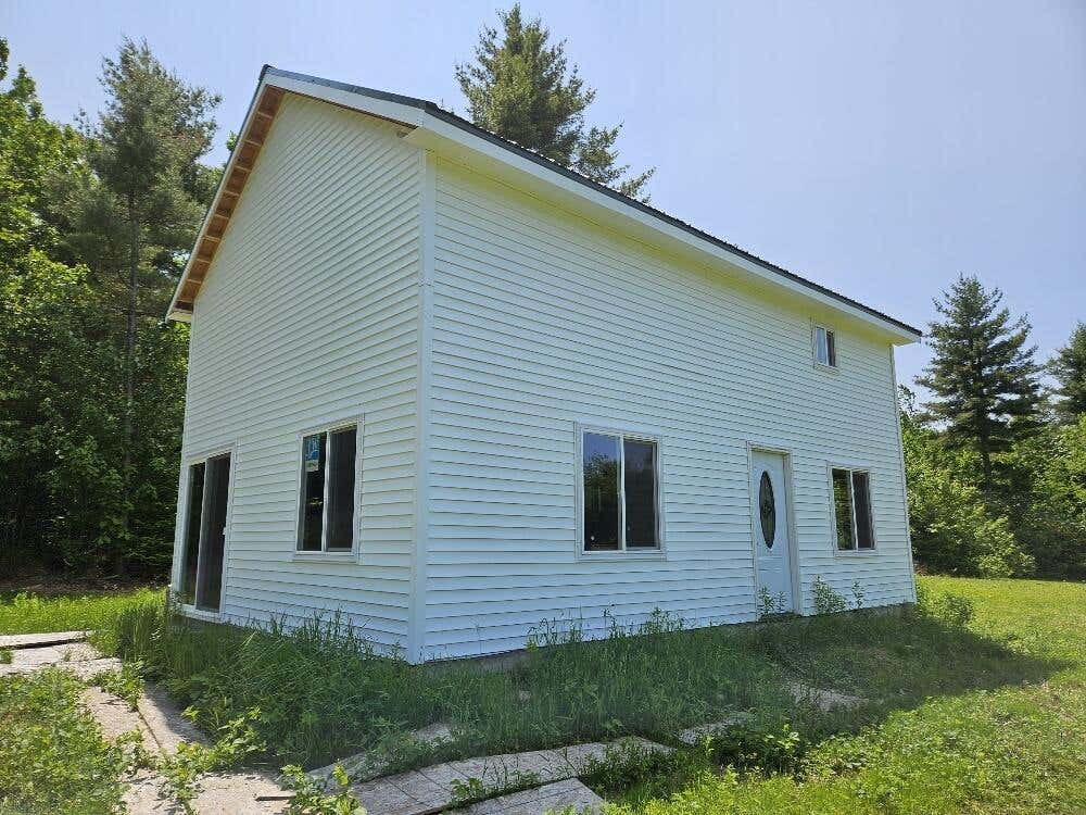 Photo of 645 Kimball Pond RD, New Sharon, ME 04955 (MLS # 1669085)
