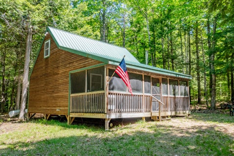 Photo of 16 Beach View Road, Dover-Foxcroft, ME 04426 (MLS # 1665724)