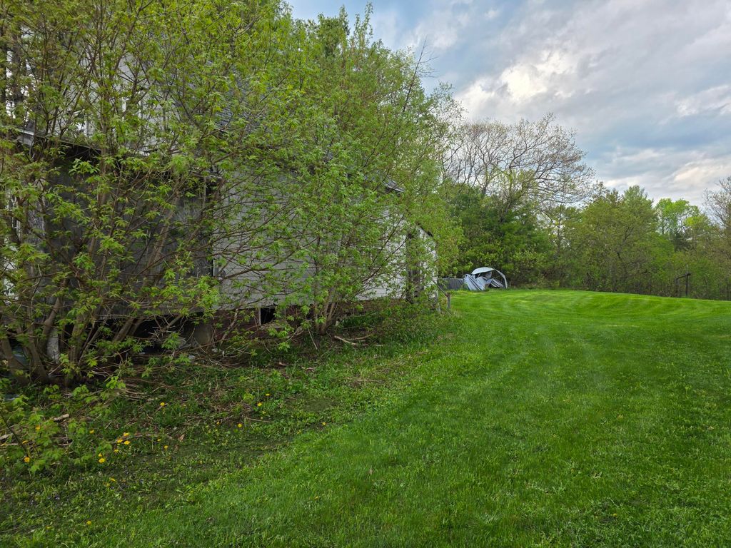 Photo of 46 Harding Street, Island Falls, ME 04747 (MLS # 1663483)