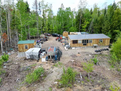 Photo of 525 River Road, Mattawamkeag, ME 04460 (MLS # 1664855)