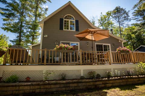 Photo of 166 Hogan Pond Lane, Oxford, ME 04270 (MLS # 1668310)