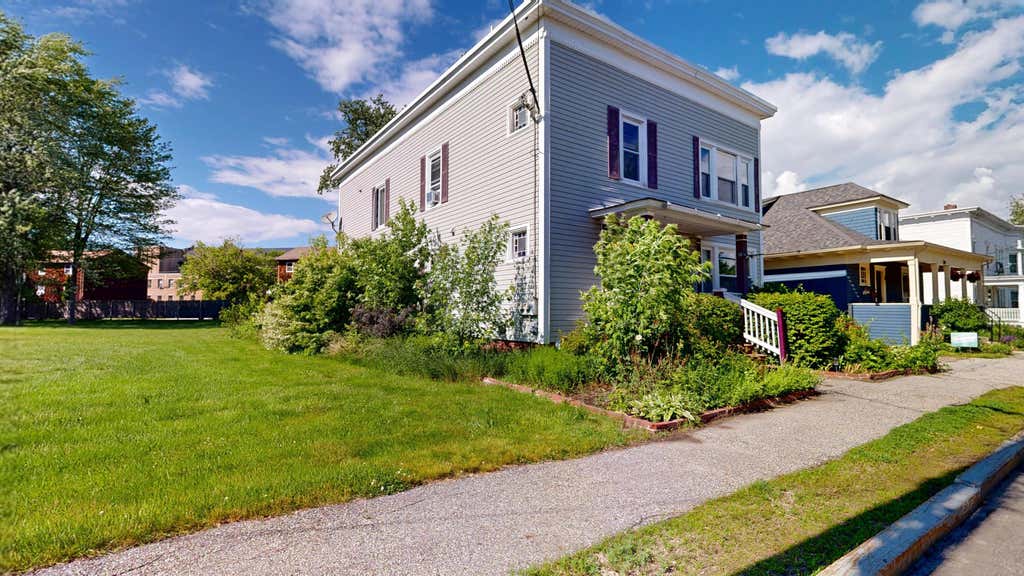 Photo of 238 Sabattus Street, Lewiston, ME 04240 (MLS # 1666955)