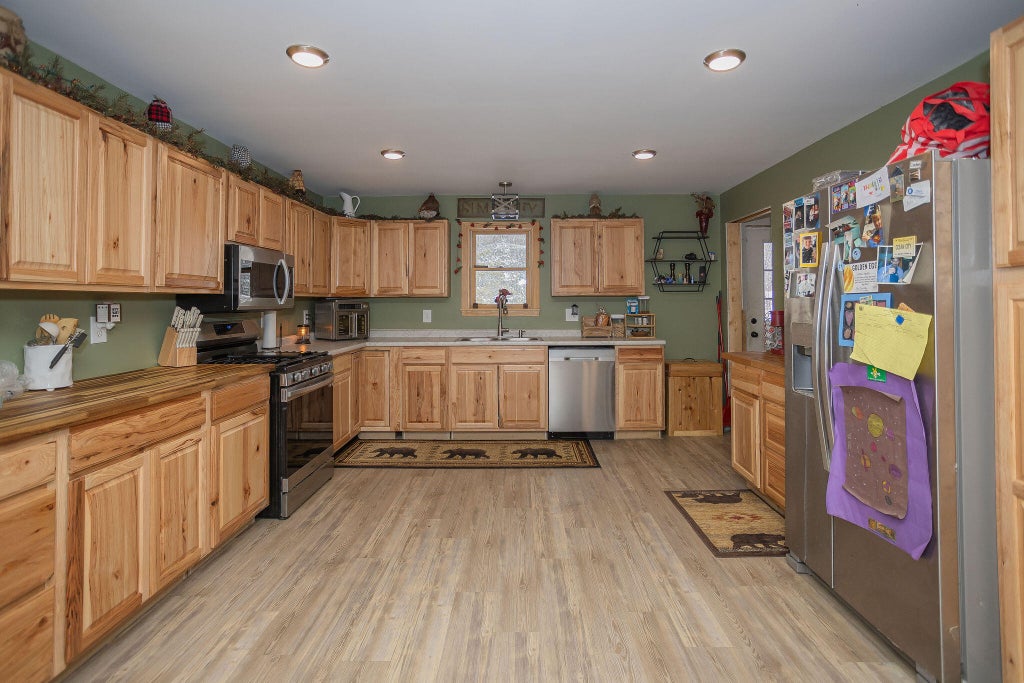 Photo of 33 Lake Street, New Vineyard, ME 04956 (MLS # 1655615)