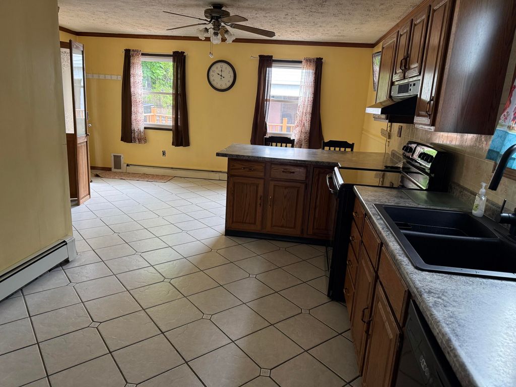 Photo of 9 Bemis Street, Livermore Falls, ME 04254 (MLS # 1664871)