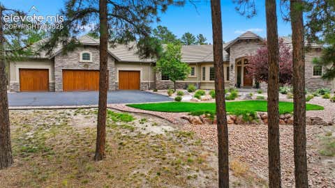 Photo of 4865 Hidden Rock Road, Colorado Springs, CO 80908 (MLS # 5380676)