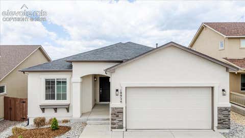 Photo of 10924 Echo Canyon Drive, Colorado Springs, CO 80908 (MLS # 9885369)