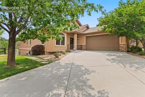 Photo of 2425 Mesa Crest Grove, Colorado Springs, CO 80904 (MLS # 5053922)