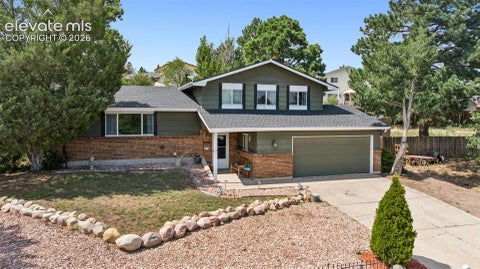 Photo of 5560 Constitution Avenue, Colorado Springs, CO 80915 (MLS # 7938116)