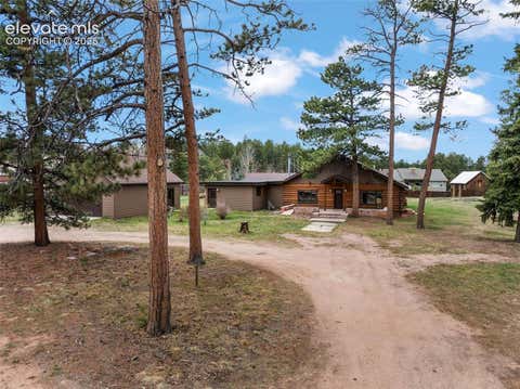 Photo of 1100 Rampart Range Road, Woodland Park, CO 80863 (MLS # 7403928)