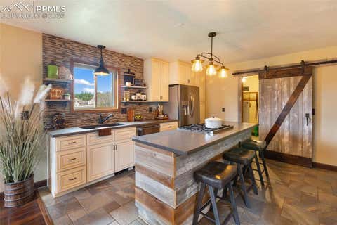 Tiny photo for 1860 Blackfoot Trail, Woodland Park, CO 80863 (MLS # 7037560)