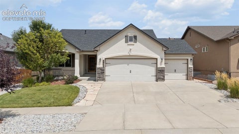 Photo of 6840 Mustang Rim Drive, Colorado Springs, CO 80923 (MLS # 1084210)