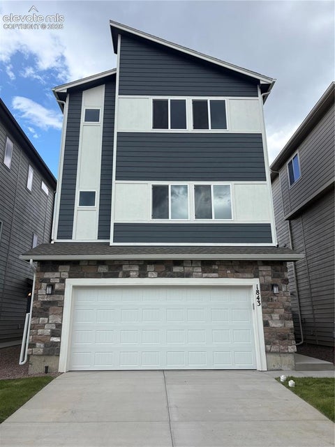 Photo of 1843 Wildland Heights, Colorado Springs, CO 80910 (MLS # 2649812)