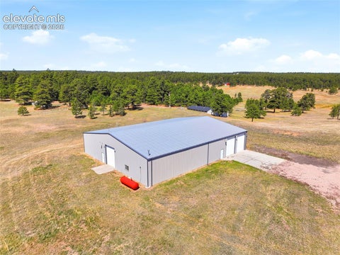 Photo of 10350 Hodgen Road, Colorado Springs, CO 80908 (MLS # 9862153)