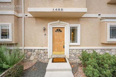 Photo of 1495 Madison Ridge Heights #A, Colorado Springs, CO 80904 (MLS # 4414736)