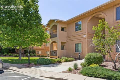 Photo of 1695 Little Bear Creek Point #304, Colorado Springs, CO 80904 (MLS # 6347002)