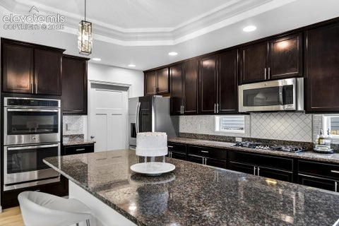 Tiny photo for 7911 Dutch Loop, Colorado Springs, CO 80925 (MLS # 3452309)