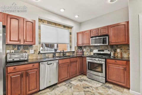Tiny photo for 1346 Mirrillion Heights, Colorado Springs, CO 80904 (MLS # 4406607)