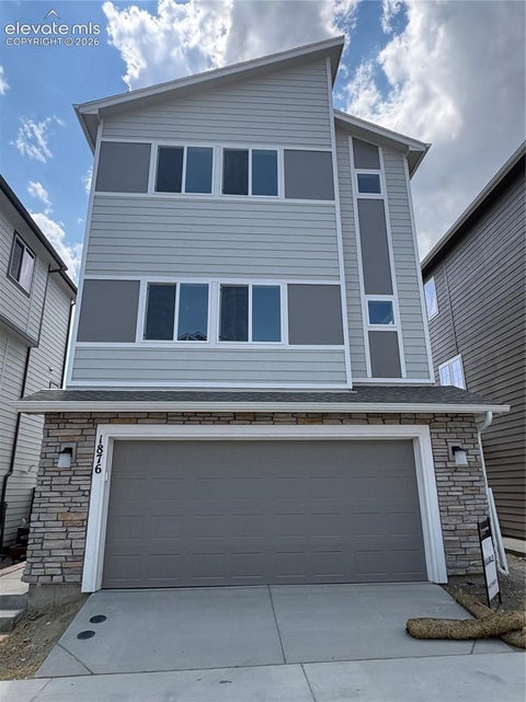 Photo of 1876 Wildland Heights, Colorado Springs, CO 80910 (MLS # 6372310)
