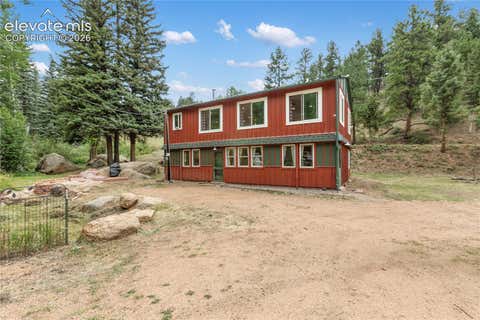 Photo of 3912 Trout Creek Road, Woodland Park, CO 80863 (MLS # 7011958)