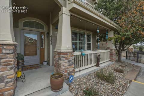 Photo of 6495 Bluffmont Point, Colorado Springs, CO 80923 (MLS # 7551087)