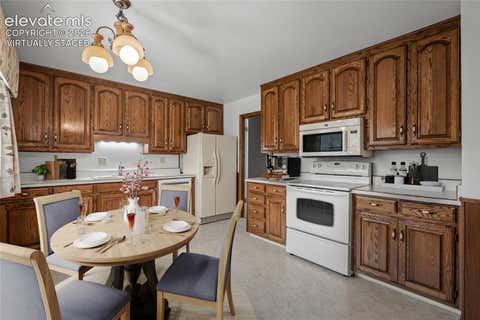 Tiny photo for 3135 Lees Lane, Colorado Springs, CO 80909 (MLS # 5035571)
