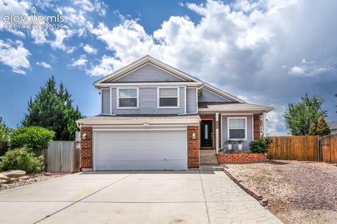 Photo of 1665 Boxtree Court, Colorado Springs, CO 80906 (MLS # 9751864)