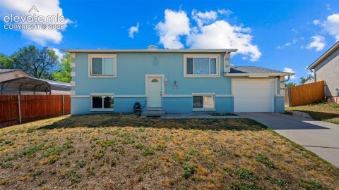 Photo of 1961 Pepperwood Drive, Colorado Springs, CO 80910 (MLS # 9988956)