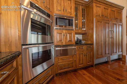 Tiny photo for 1915 Fox Mountain Point, Colorado Springs, CO 80906 (MLS # 5875982)