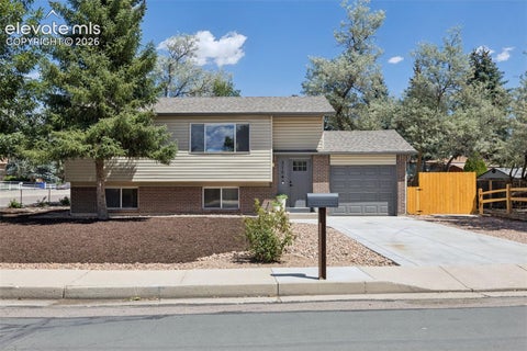 Photo of 3704 Surrey Lane, Colorado Springs, CO 80918 (MLS # 2699510)