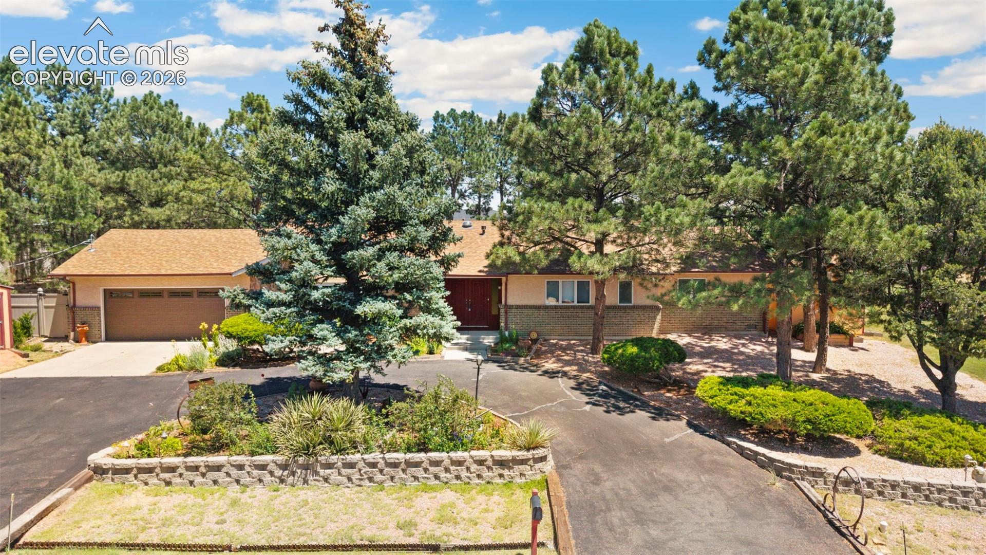 10765 Falling Star Road