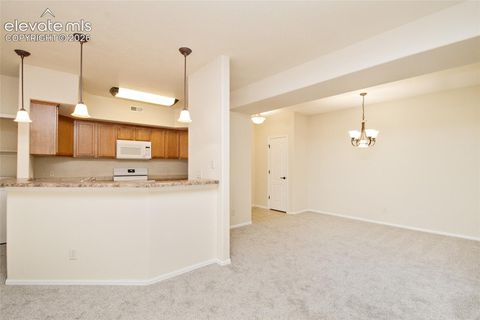 Tiny photo for 1935 Montura View #104, Colorado Springs, CO 80919 (MLS # 5488139)