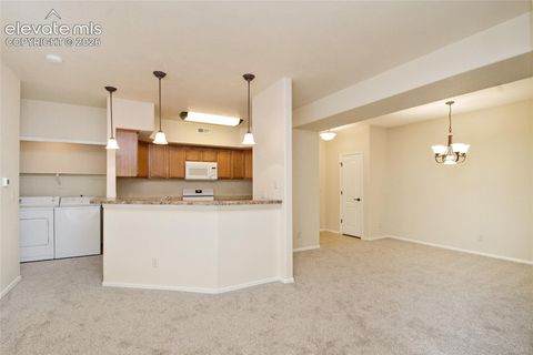 Tiny photo for 1935 Montura View #104, Colorado Springs, CO 80919 (MLS # 5488139)