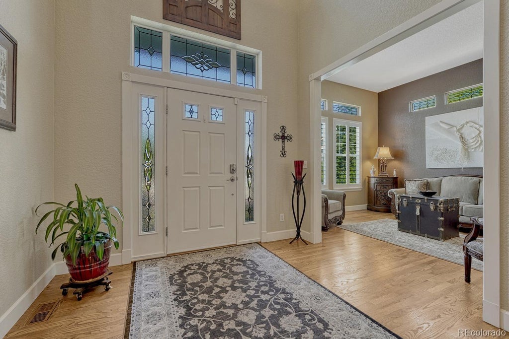 Photo of 10744 Addison Court, Littleton, CO 80126 (MLS # 8127566)