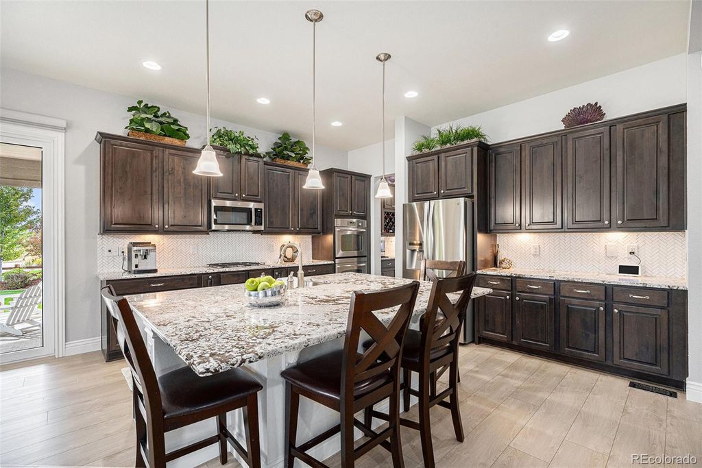 Photo of 15171 W 62nd Way, Arvada, CO 80403 (MLS # 7303690)