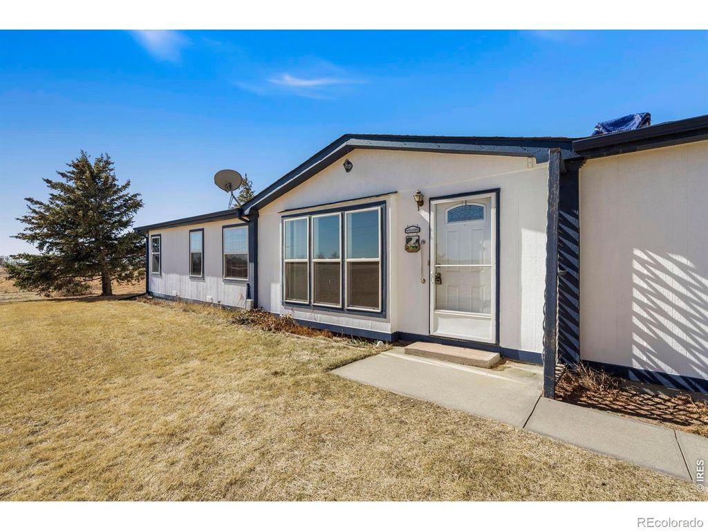 Photo of 7055 N County Road 19, Fort Collins, CO 80524 (MLS # IR1053032)