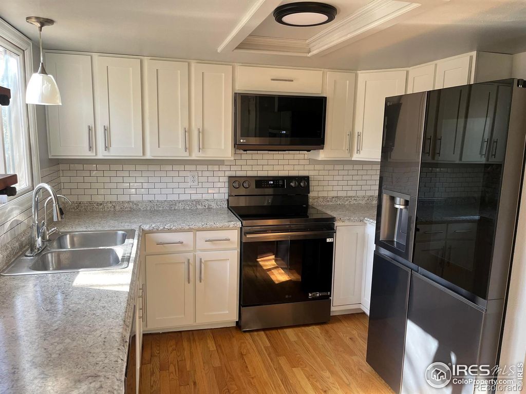 Photo of 1974 E 18th Street, Loveland, CO 80538 (MLS # IR1046496)