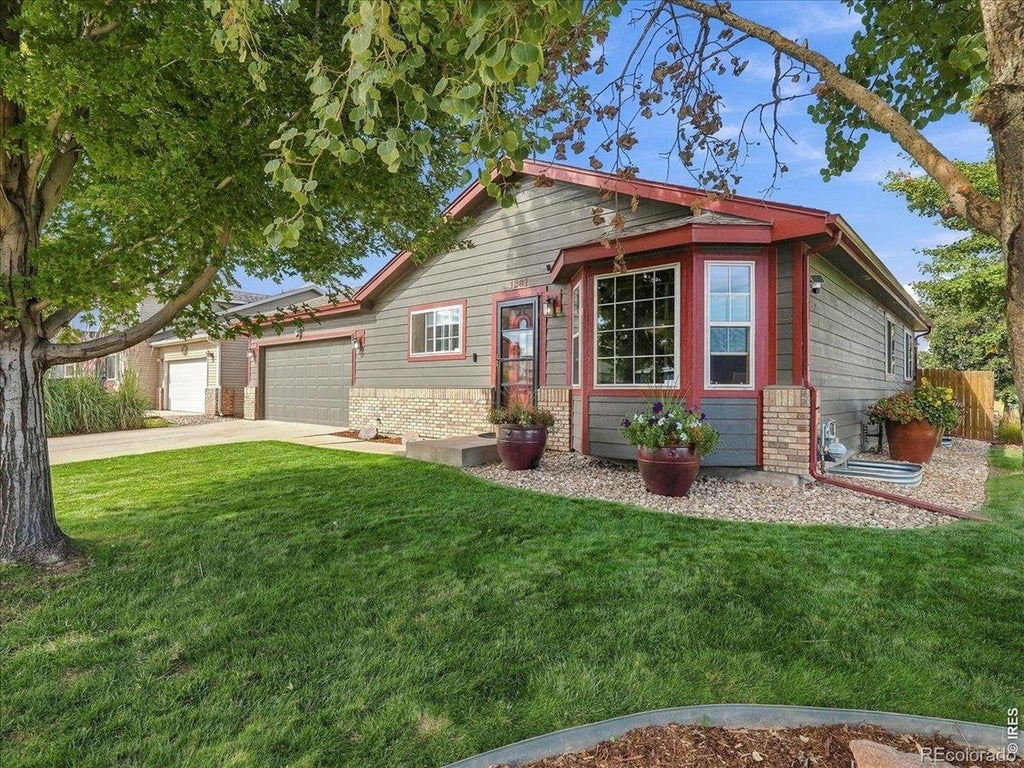 Photo of 1381 Farmland Lane, Milliken, CO 80543 (MLS # IR1070207)