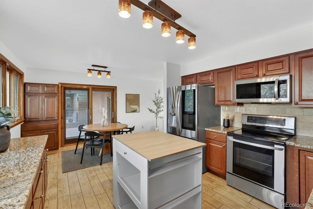 Photo of 1348 S Drexel Way, Lakewood, CO 80232 (MLS # 1998084)