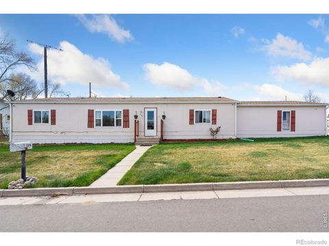 110 Ash Street Log Lane Village CO 80705