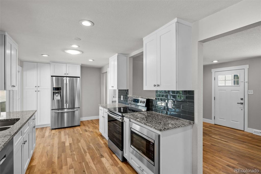 Photo of 13537 W Alaska Drive, Lakewood, CO 80228 (MLS # 9076975)