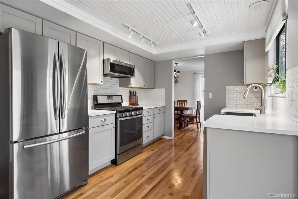 Photo of 5035 S Evanston Street, Aurora, CO 80015 (MLS # 4920661)