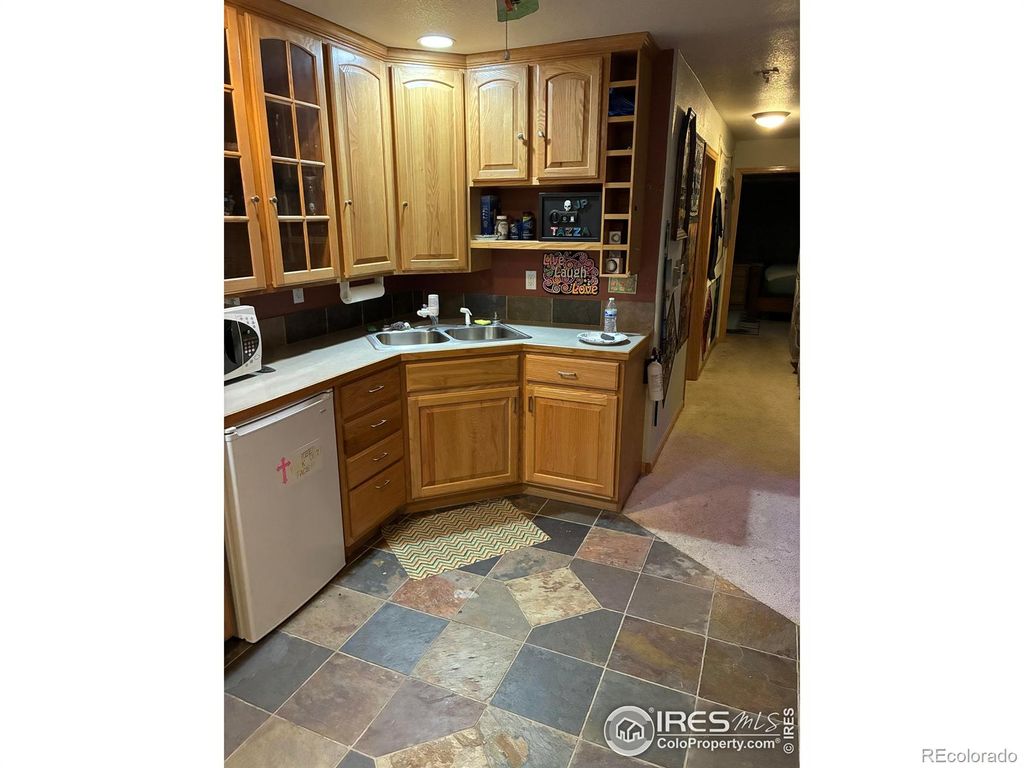 Photo of 941 S Rachel Avenue, Milliken, CO 80543 (MLS # IR1051646)