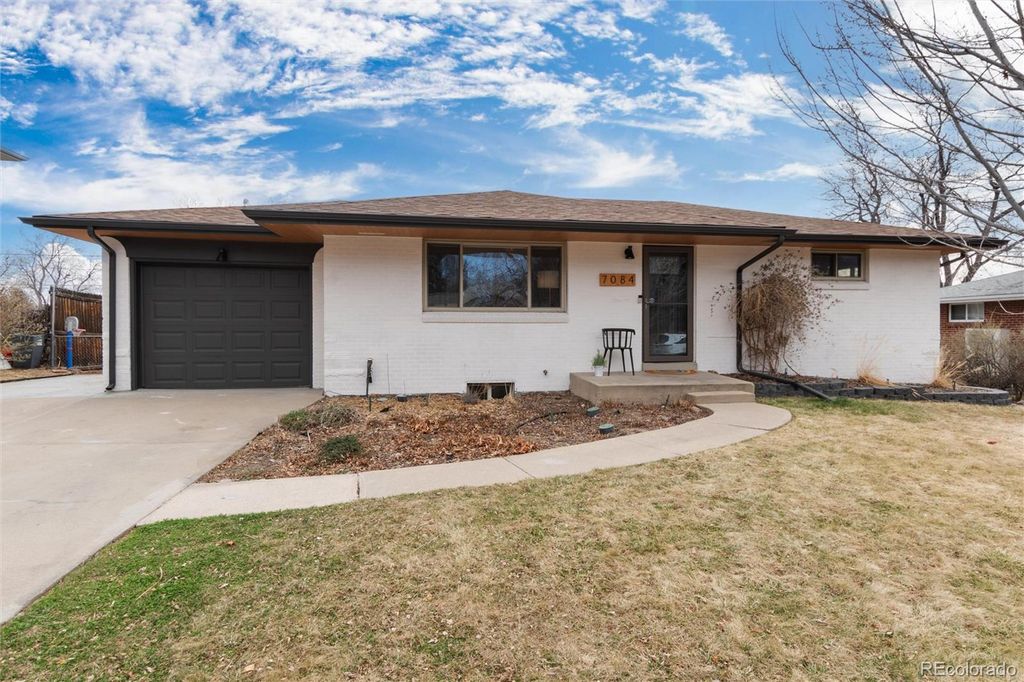 Photo of 7084 Newland Street, Arvada, CO 80003 (MLS # 7345838)
