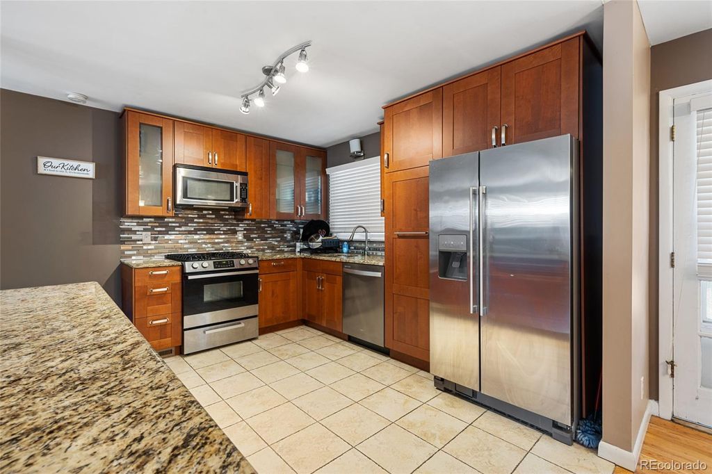 Photo of 5136 S Washington Street, Littleton, CO 80121 (MLS # 6399892)