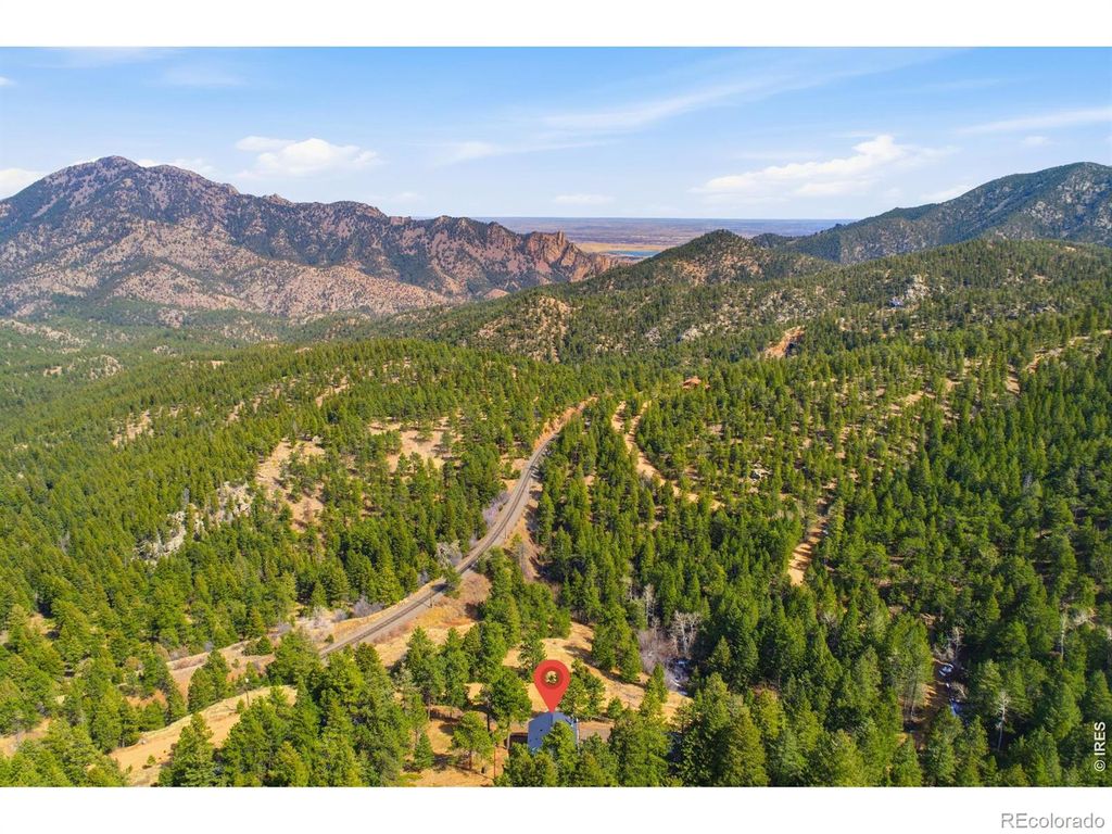 Photo of 910 Chute Road, Golden, CO 80403 (MLS # IR1054746)