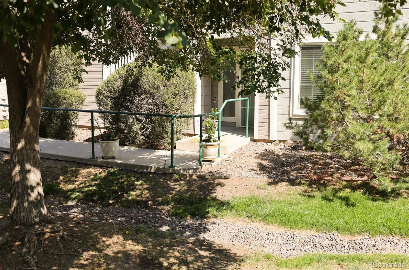 8342 Pebble Creek Way 102 in Canyon Ranch, Highlands Ranch CO