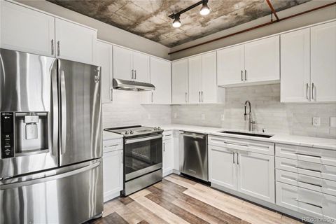 Photo of 1475 Delgany Street #404, Denver, CO 80202 (MLS # 4155568)