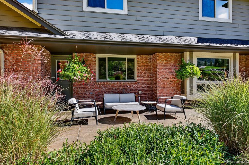 Photo of 30 Tamarade Drive, Littleton, CO 80127 (MLS # 7492415)